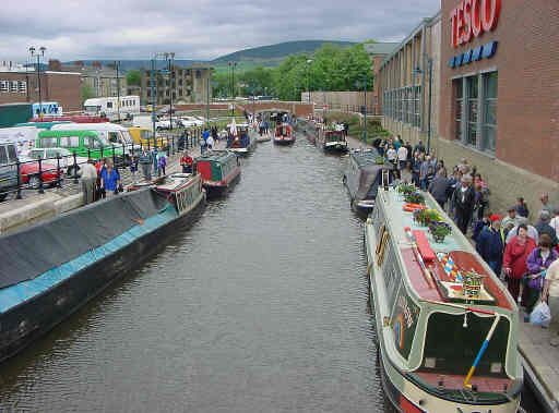 Visiting boats line both sides of the canal