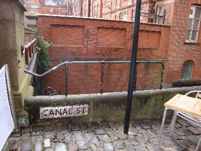 iron railing along the lowest section of wall, Canal Street